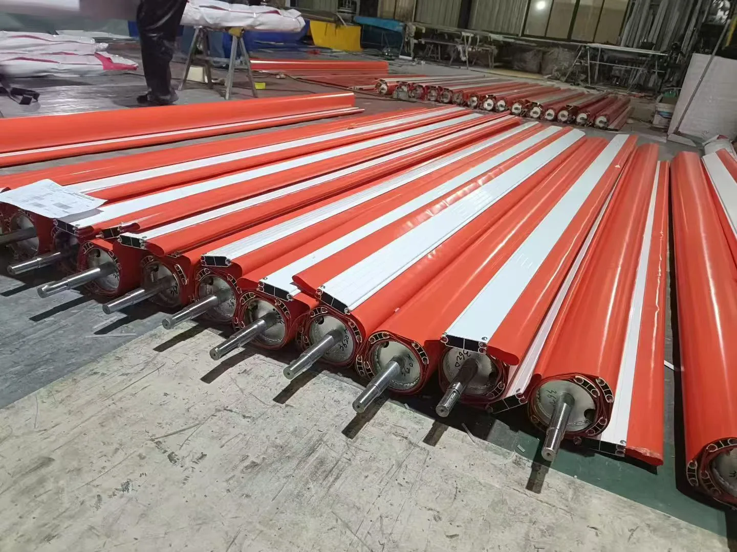 Orange rolling shutter door units manufactured in a batch